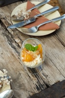 A colorful display of mango desserts arranged artfully on a rustic wooden table.