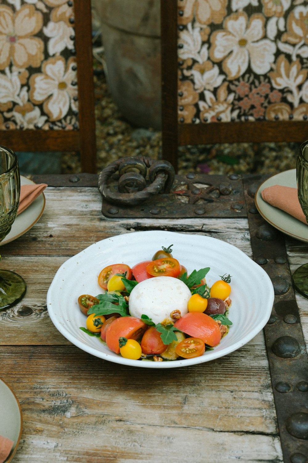 a white plate topped with lots of different types of vegetables