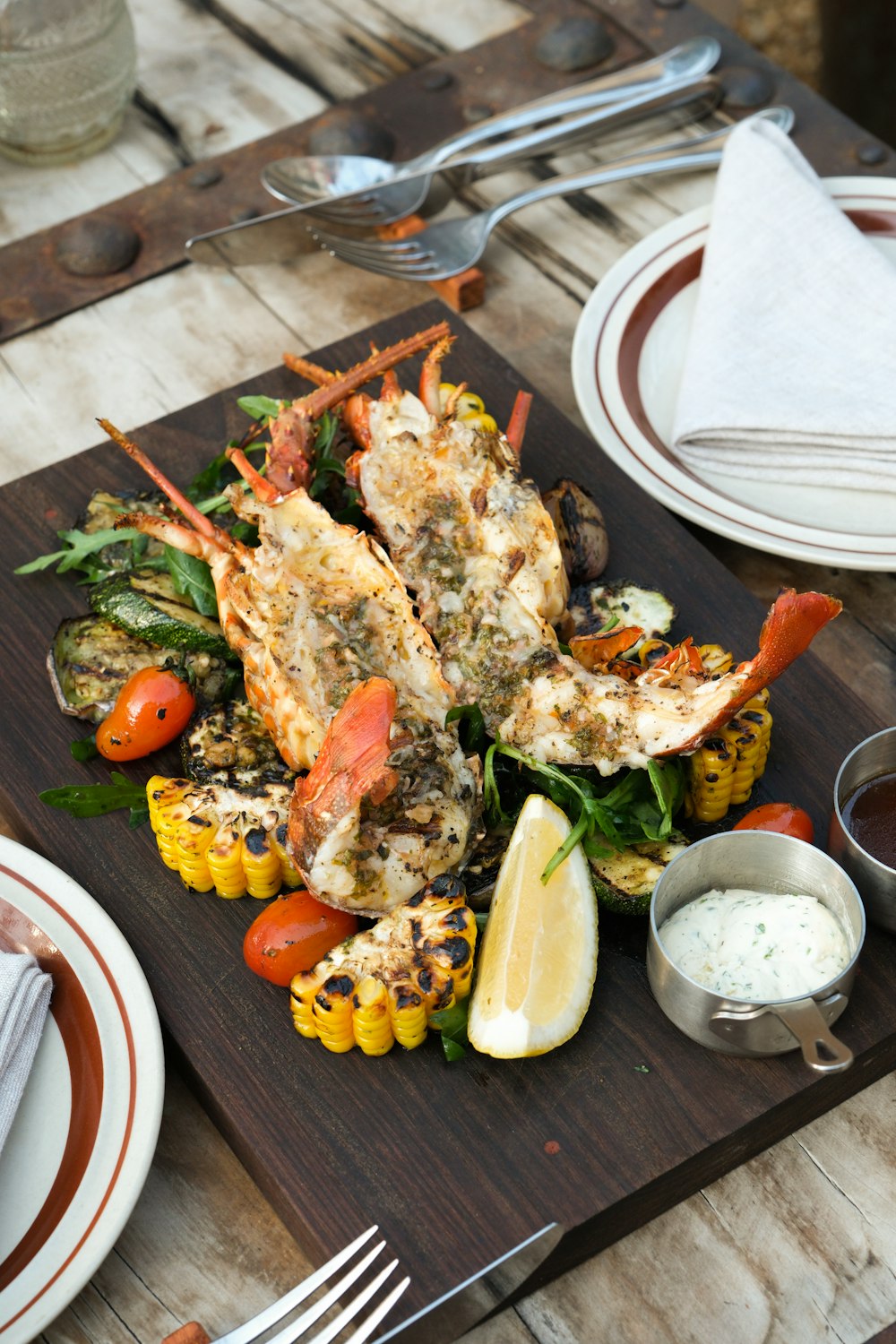 a plate of food on a wooden table