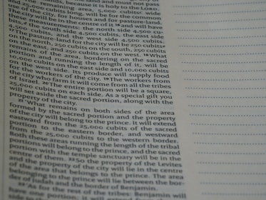 A close-up of a land document with specifications.