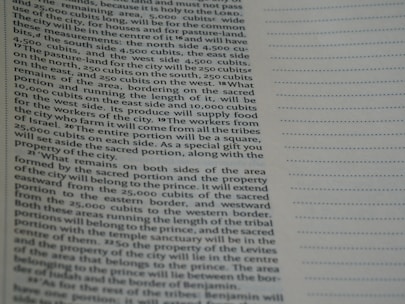 Close-up of a detailed land report with charts and legal references.