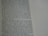 A close-up view of a page from a book containing printed text. The text is structured in paragraphs and discusses measurements, locations, and property designations. On the right side, there is a column with evenly spaced, horizontal, dotted lines.
