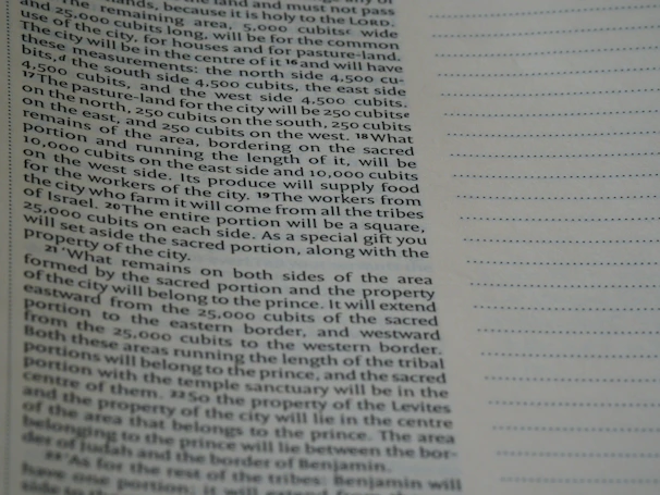 Close-up of a detailed property inspection report with photos and notes.