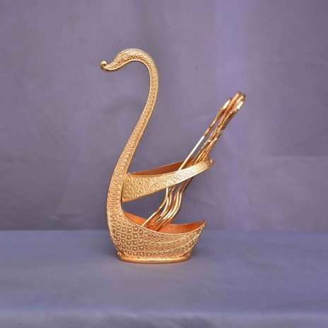 A close-up of a swan sculpture representing grace and beauty.