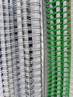 Stacks of notebooks and planners with vibrant covers, ready for the new school year.