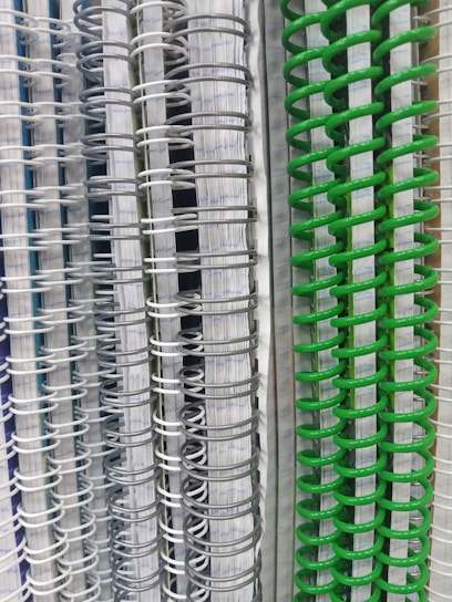 Round image of colorful notebooks stacked neatly