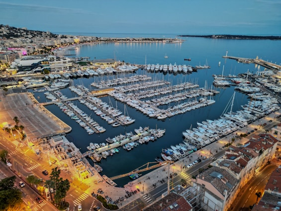 a marina filled with lots of boats at night