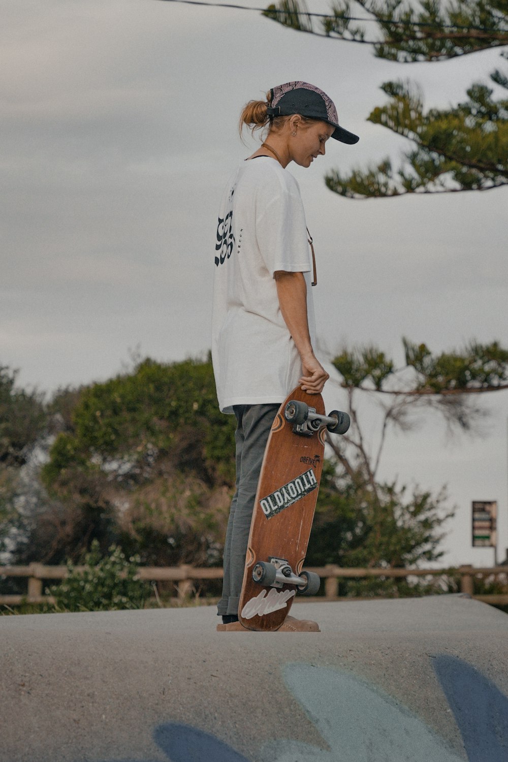 a person standing on top of a skateboard on a ramp