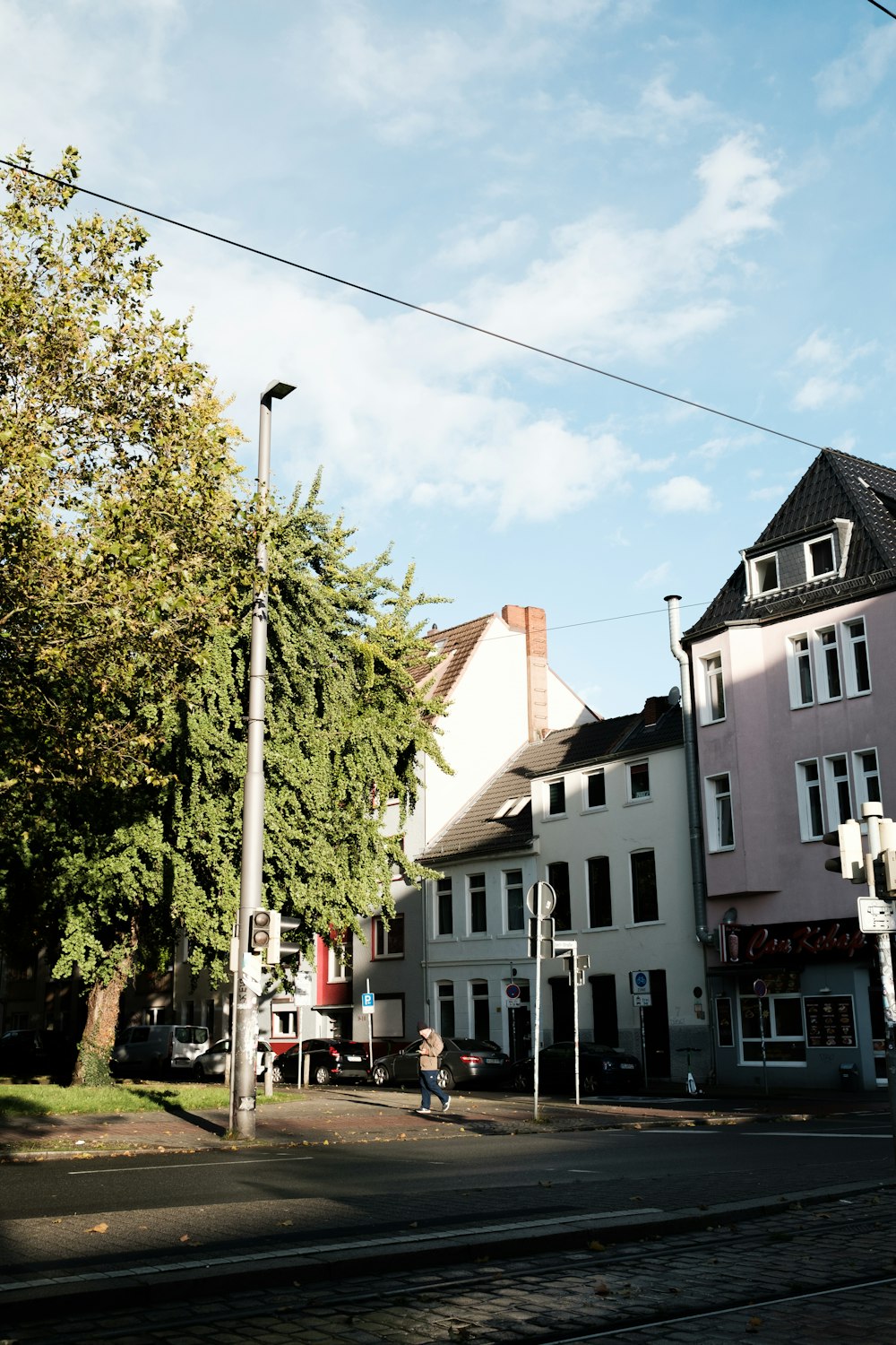 a row of buildings on a street corner