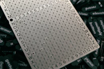 Minimalist schematic of a 4x4 ternary systolic array with technical annotations.