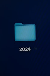 A neat folder system on a computer screen showing documents sorted by year.