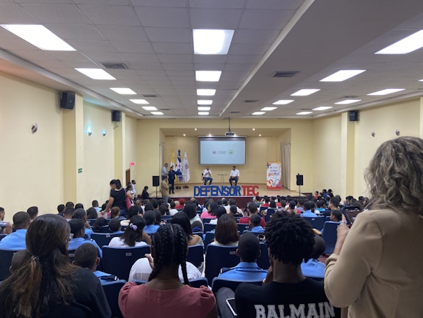 A community seminar in progress with attentive attendees and a passionate speaker.