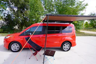 A Crafts and Creators van parked outside a Fresno home ready for emergency service.