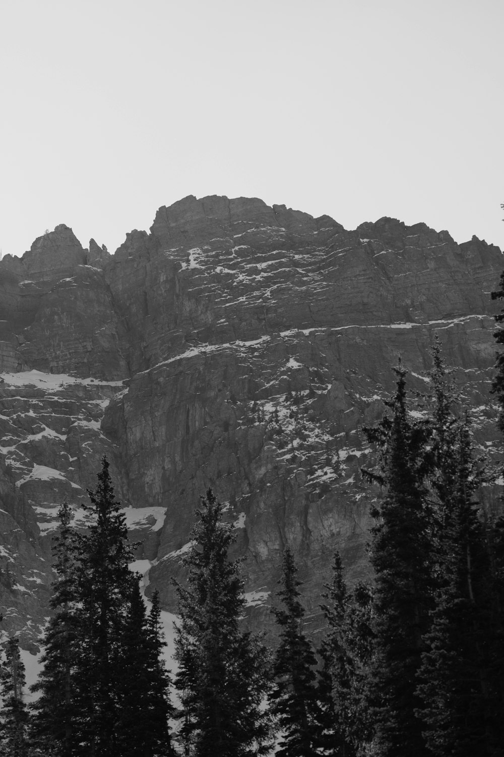 a black and white photo of a mountain