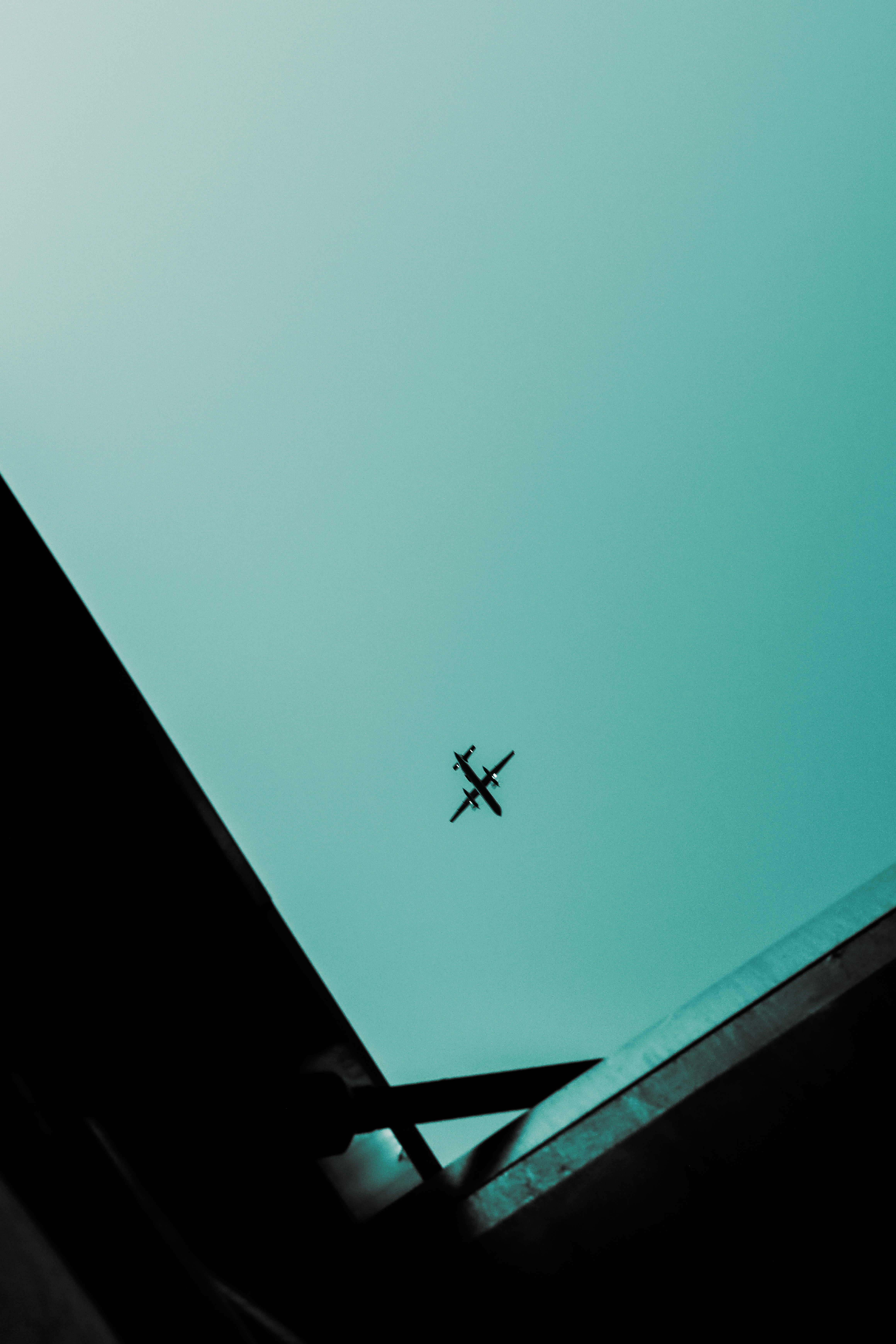 an airplane is flying high in the sky