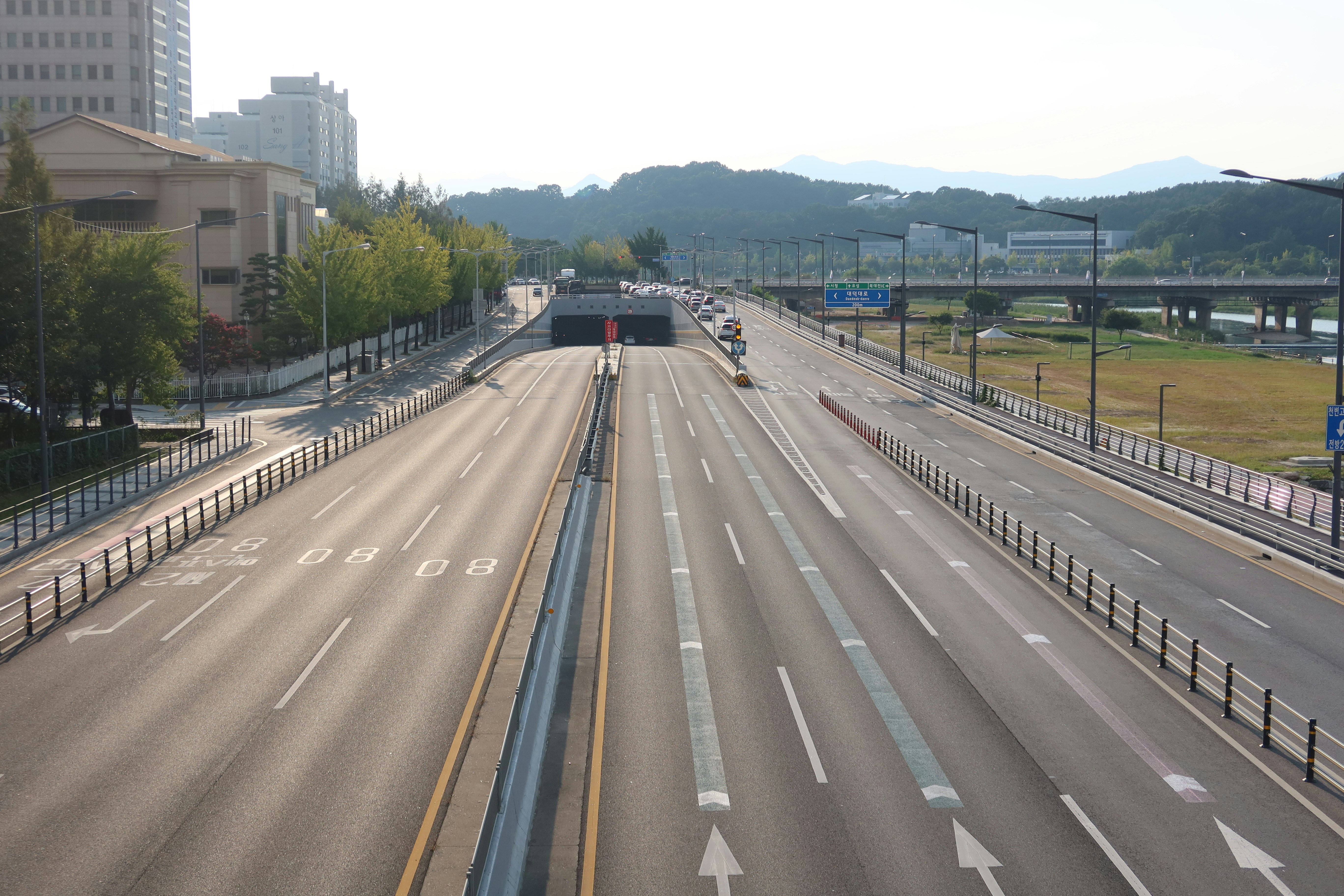 an empty highway in the middle of a city