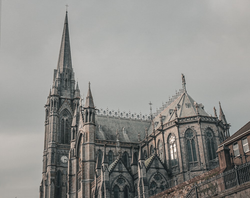 a large cathedral with a clock on it's side