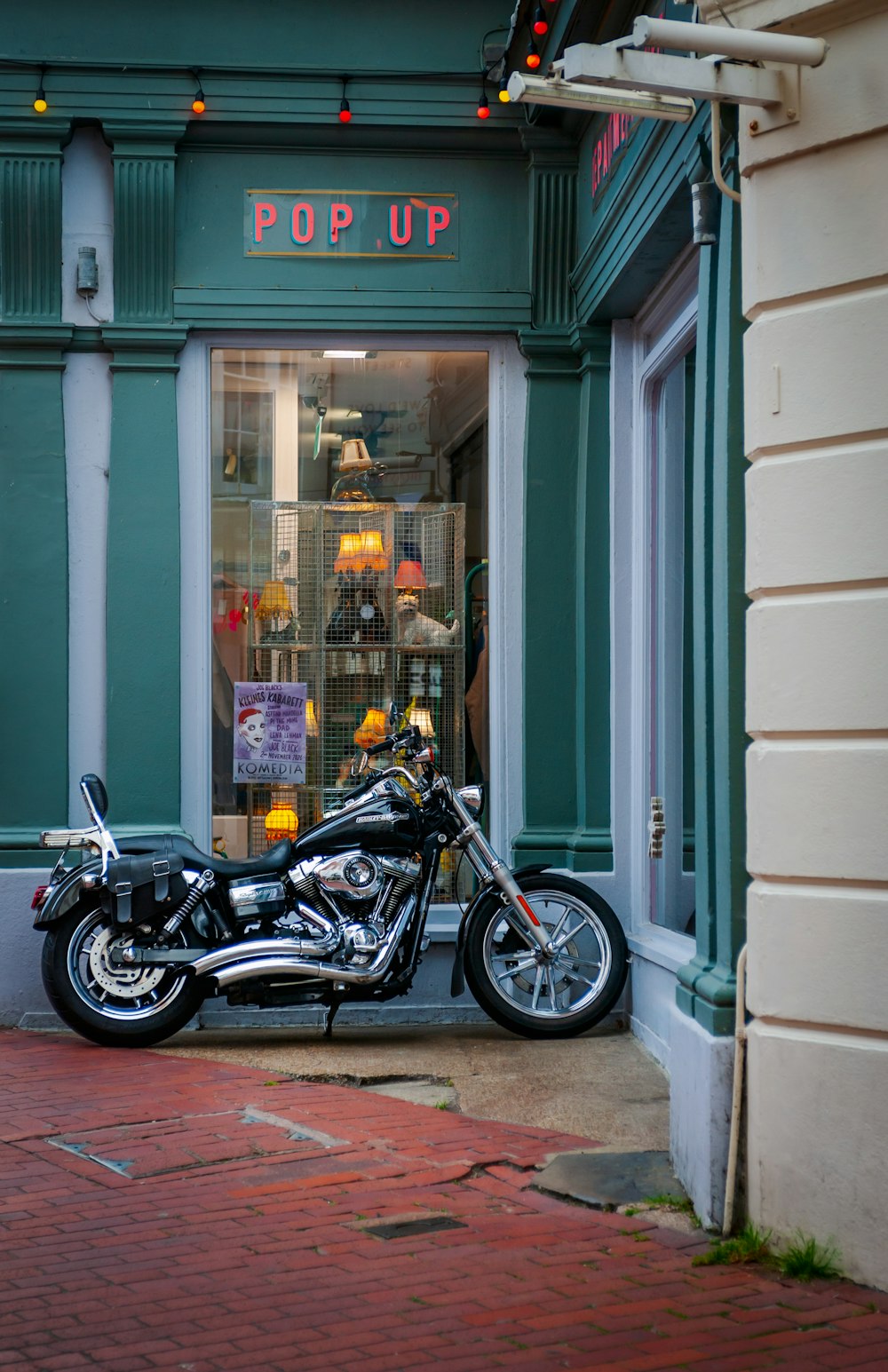 a motorcycle parked in front of a store