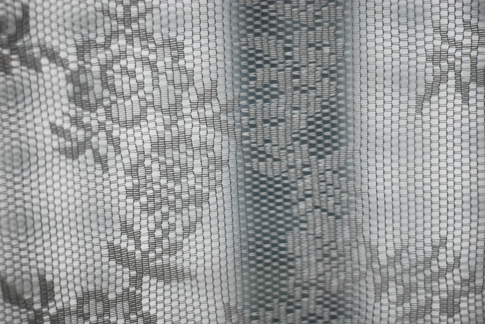 a close up of a curtain with a pattern on it