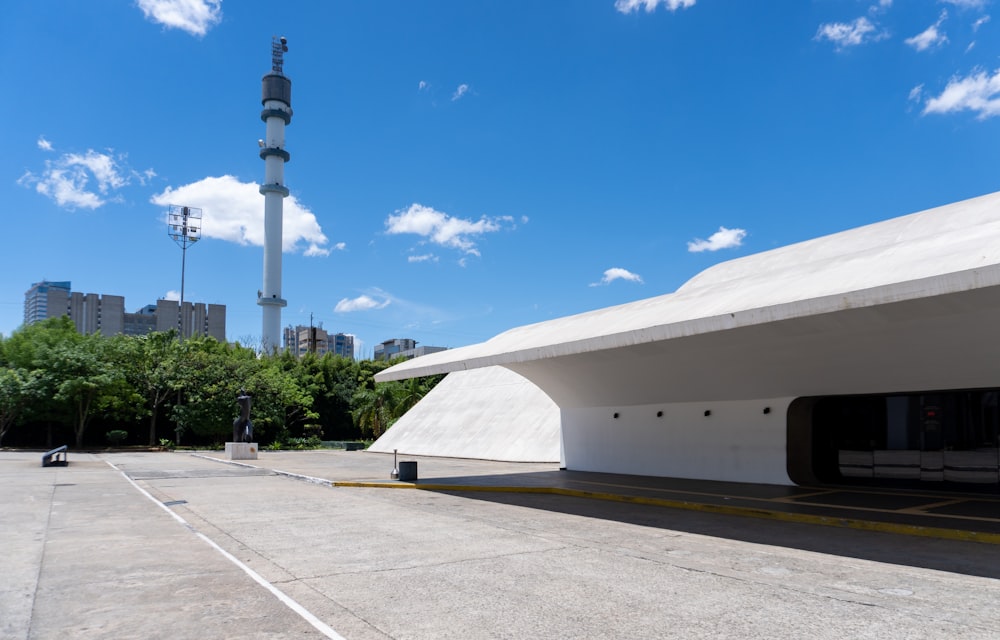 a parking lot with a building in the background