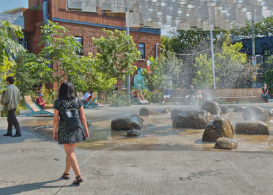 A calming wellness area featuring soothing water elements and comfortable seating.