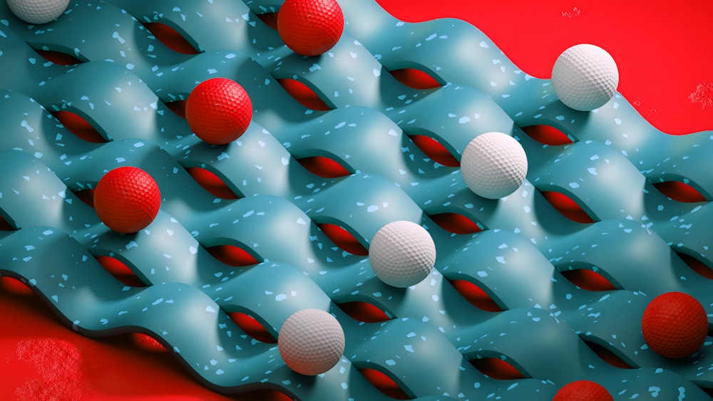 a group of balls sitting on top of a red surface