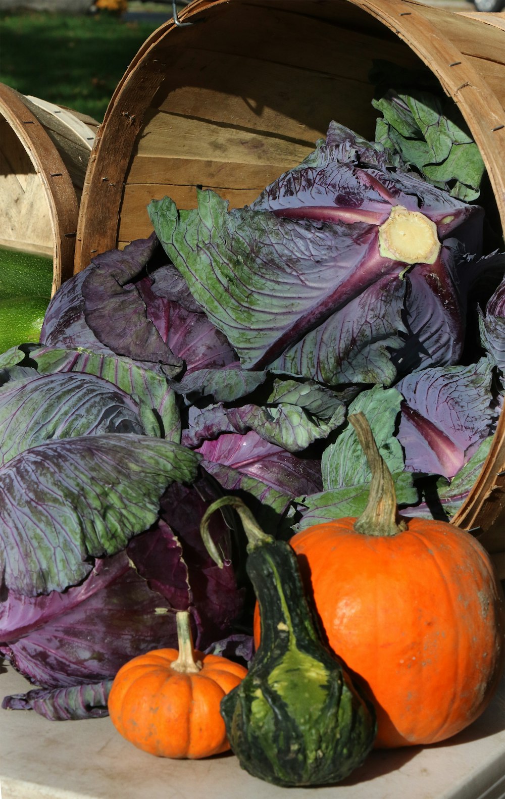 a basket filled with lots of different types of vegetables