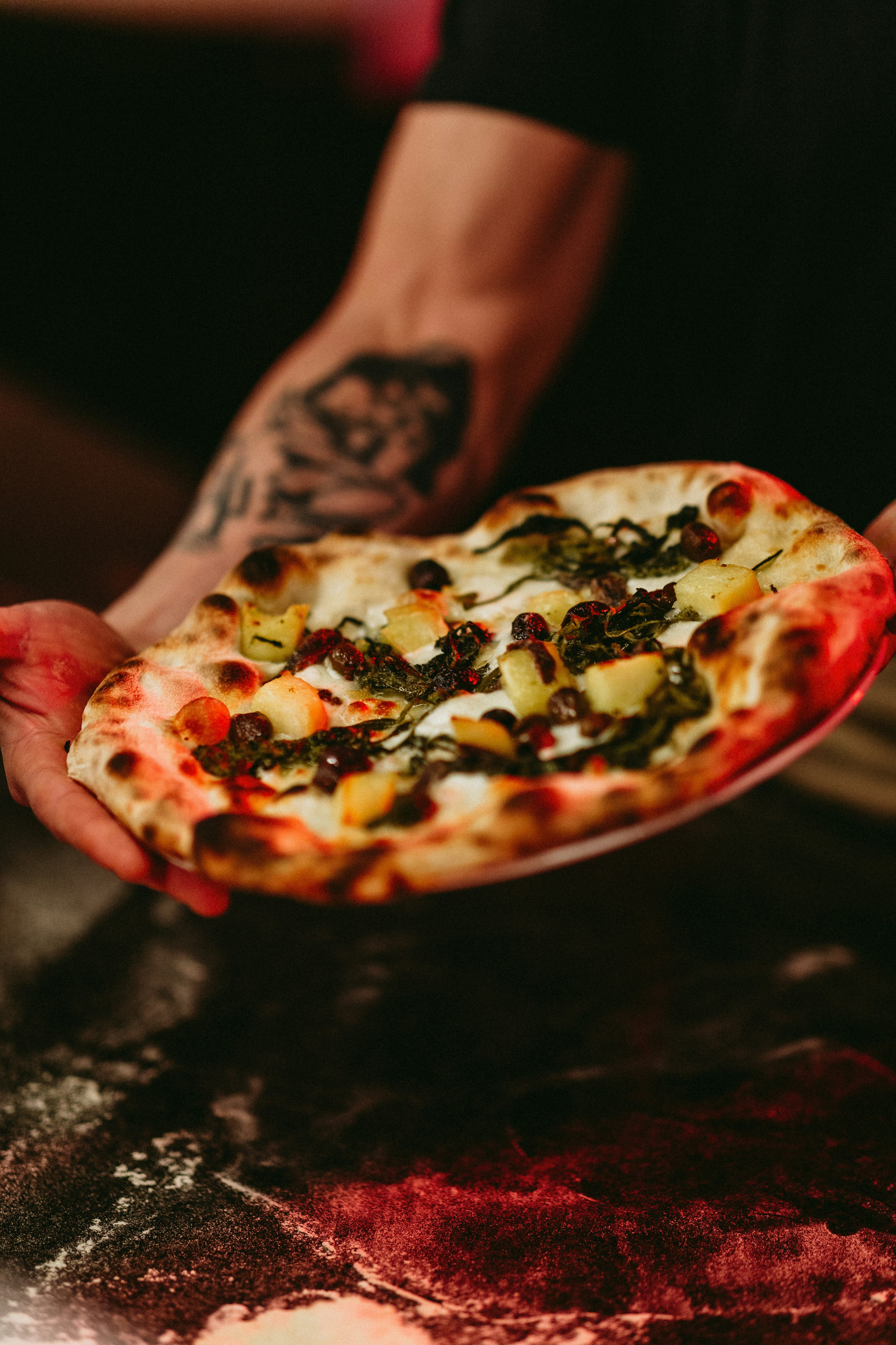 Fresh pizza with vibrant toppings, overhead view, bright colorful ingredients