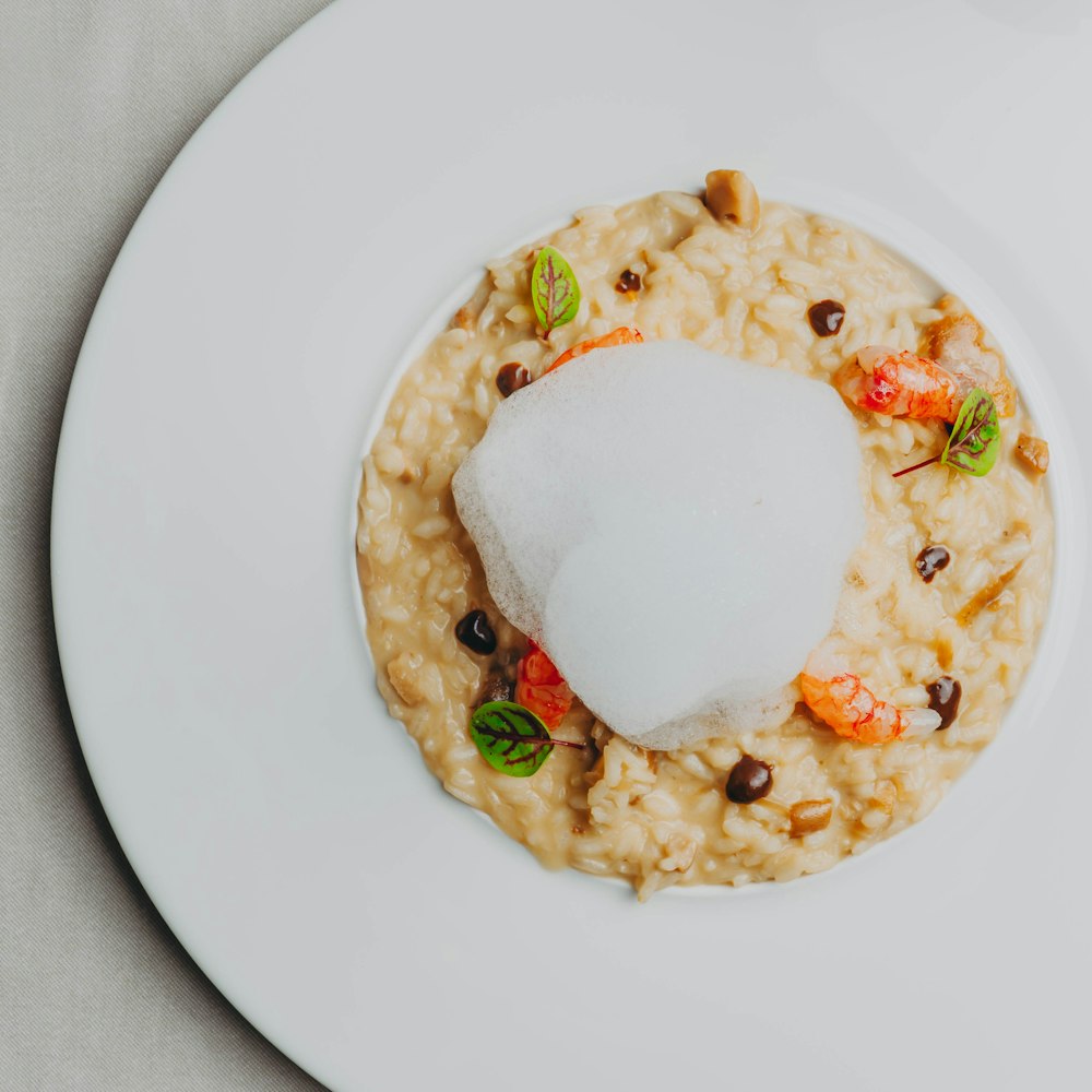 a white plate topped with rice and beans