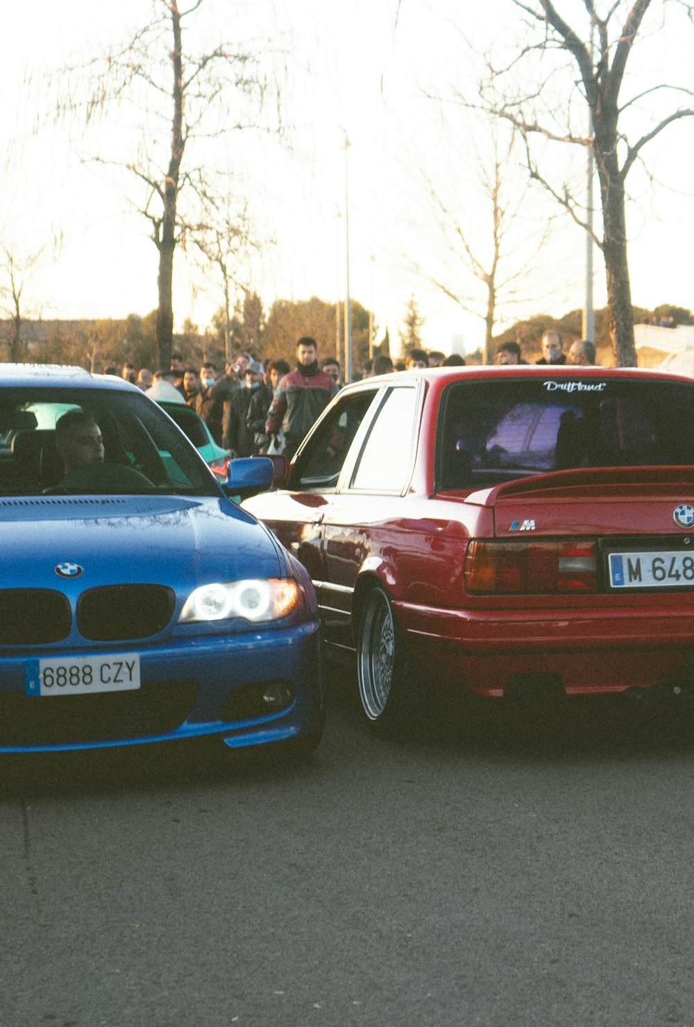 a couple of cars parked next to each other