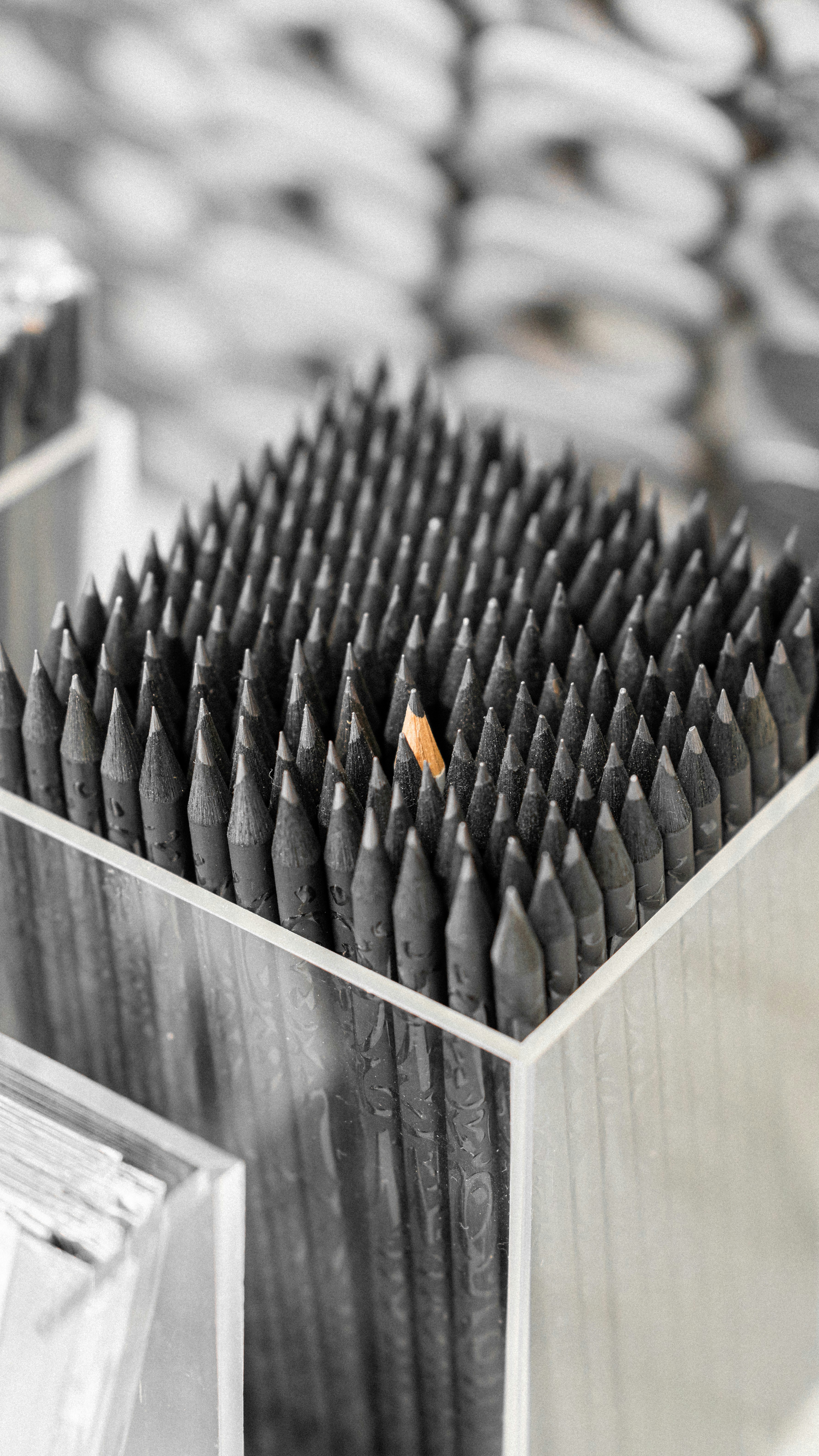 a close up of a metal object with a lot of holes in it