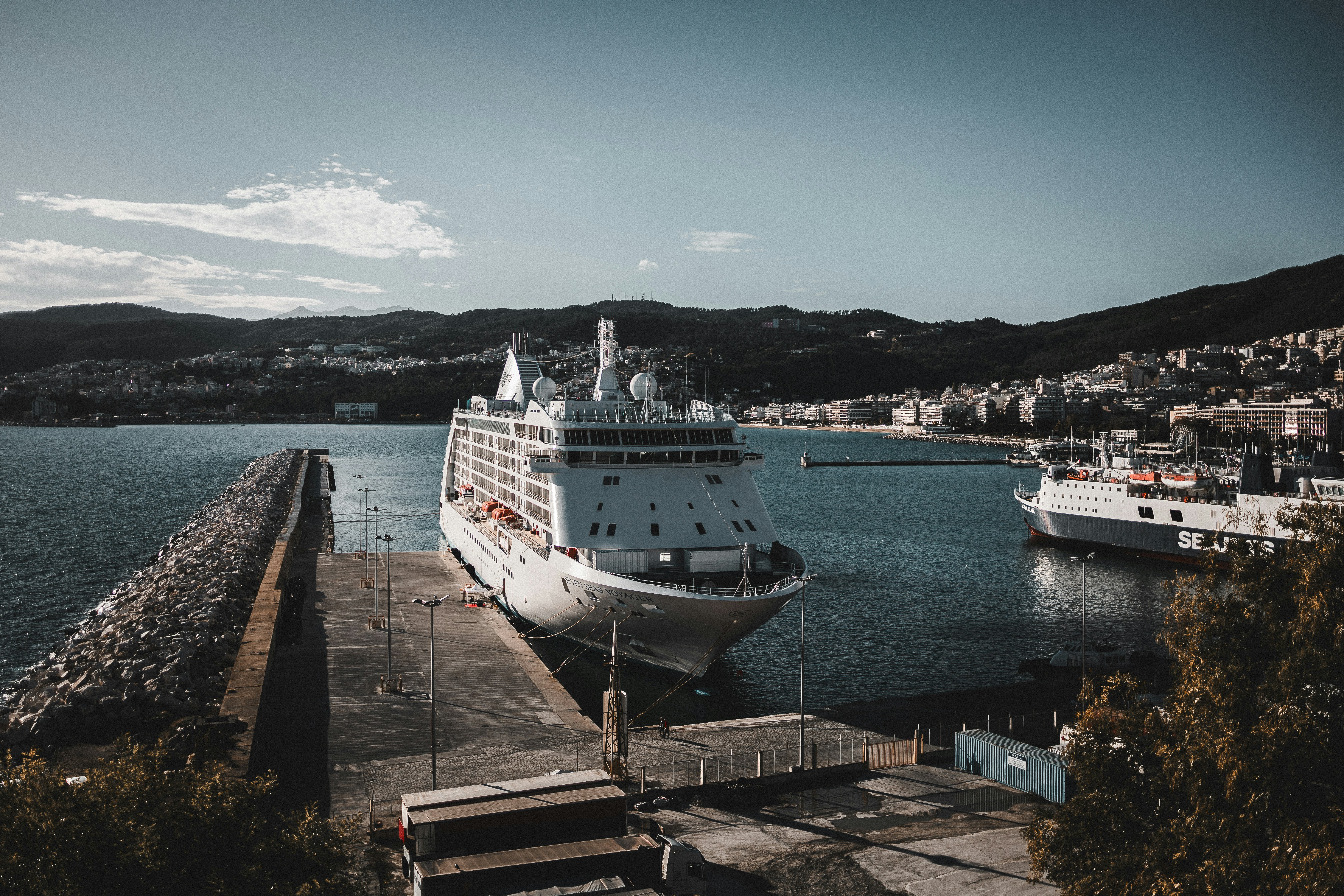 a cruise ship is docked at a dock
