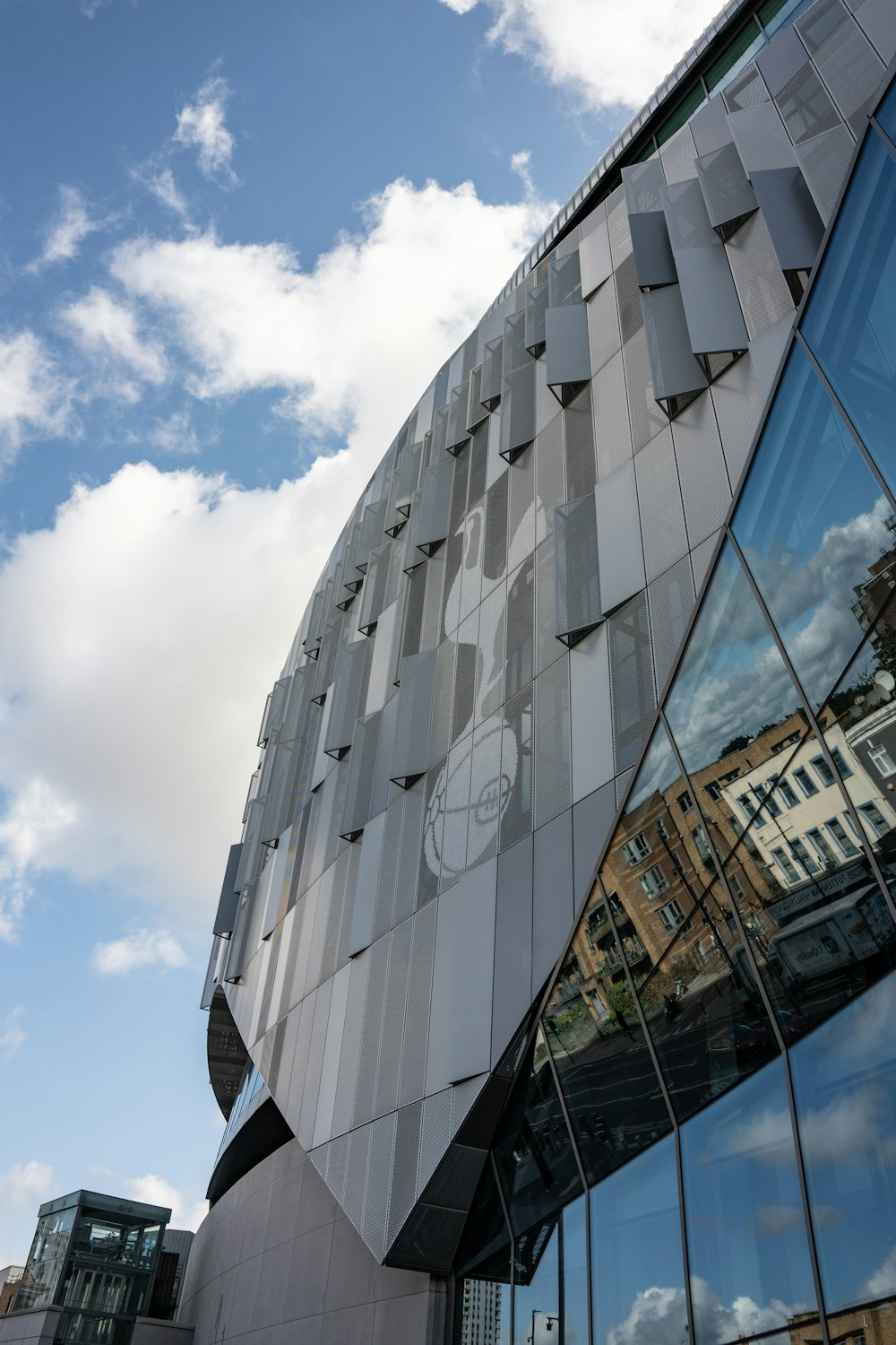 a large building with a clock on the side of it