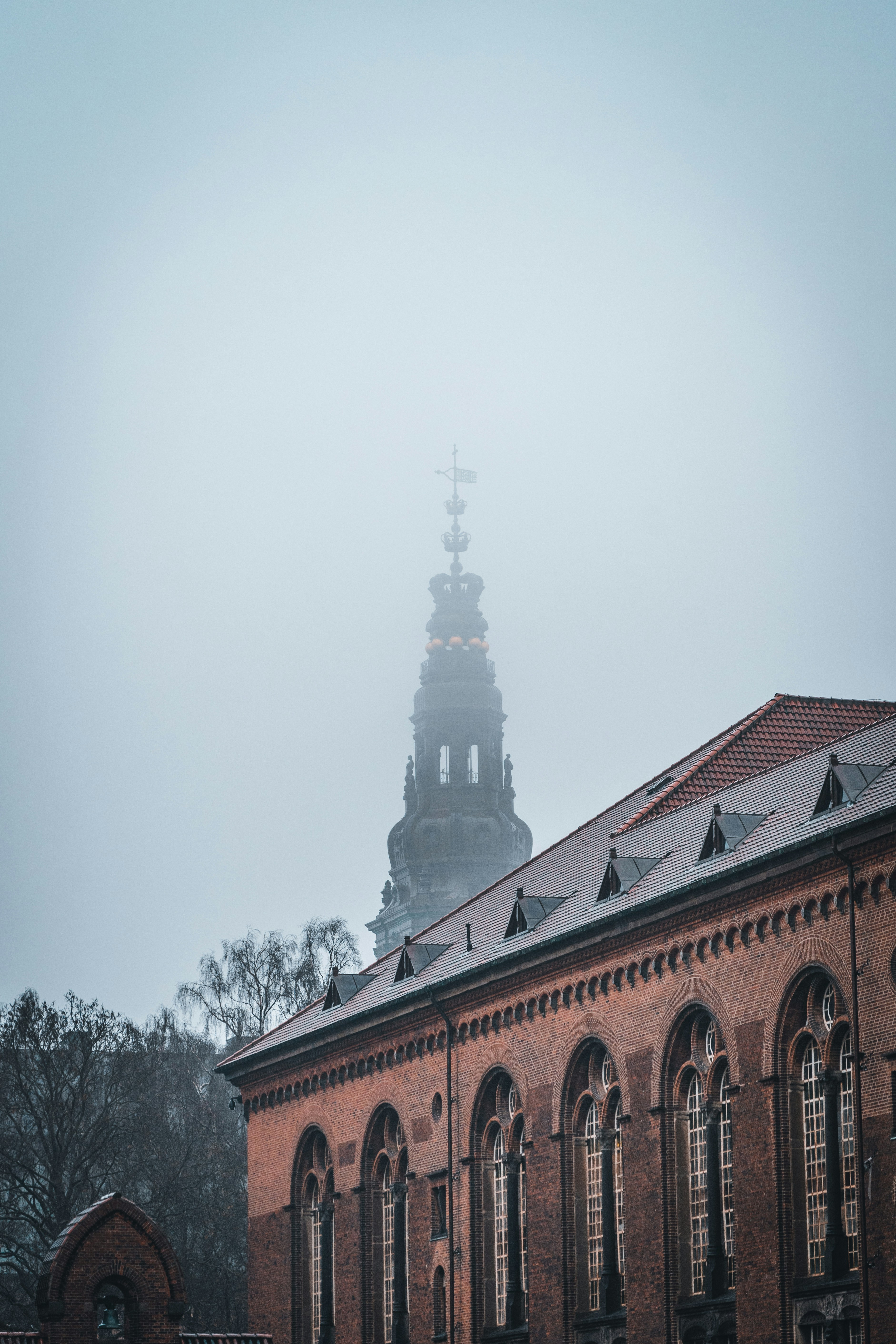a building with a steeple in the background