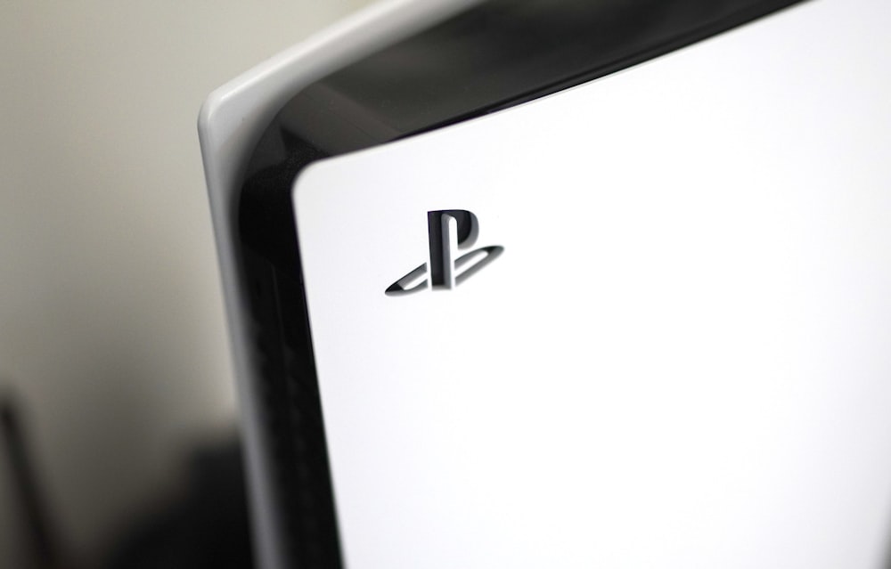 a close up of a playstation logo on a computer