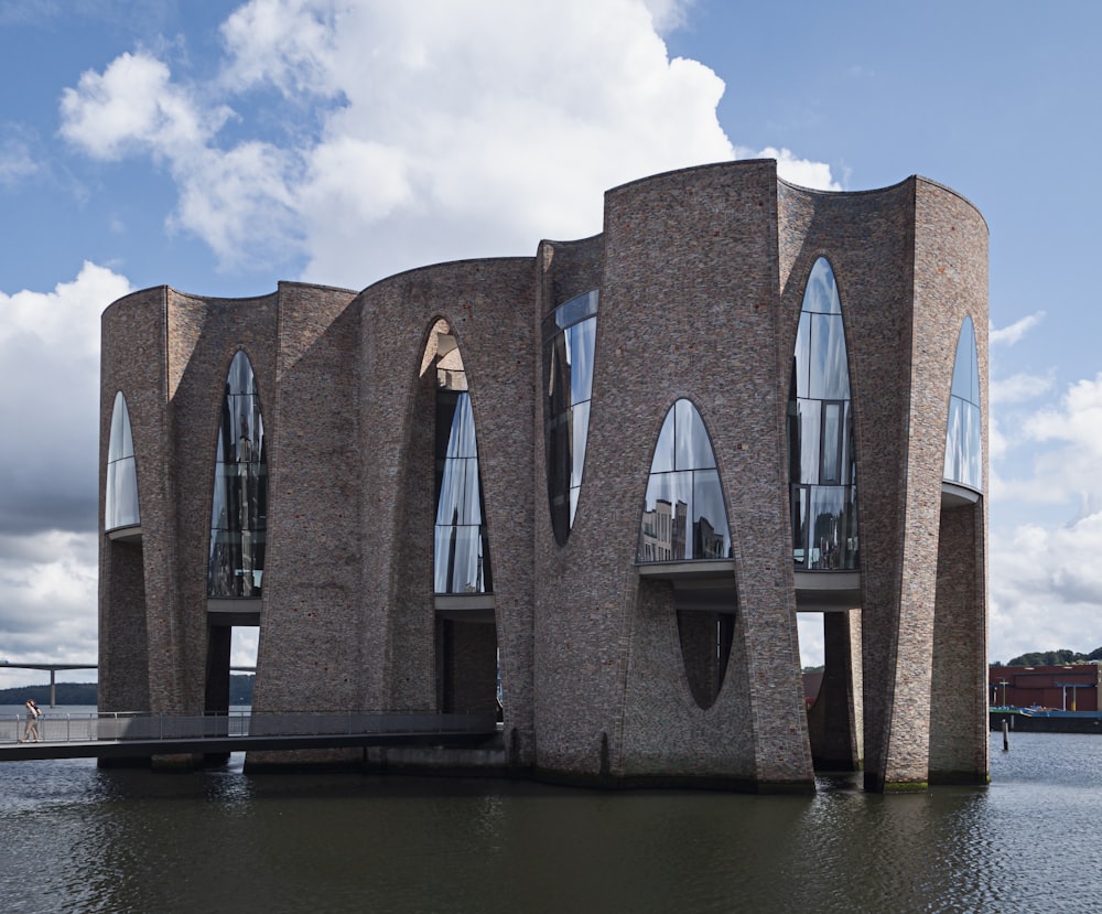 a large building sitting on top of a body of water