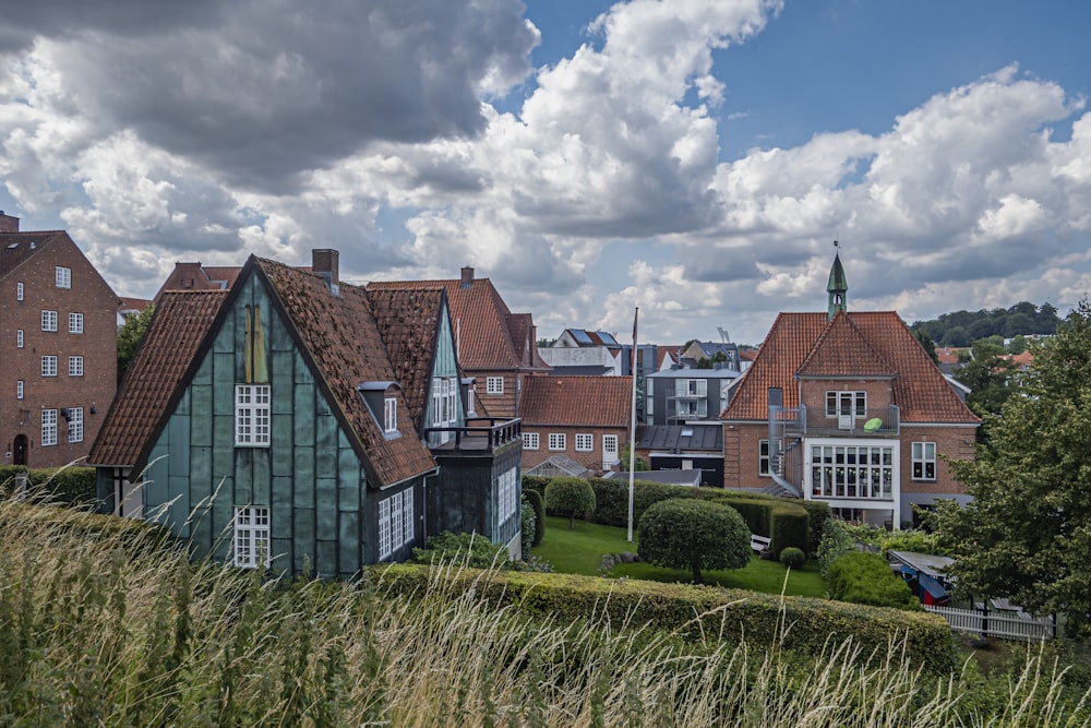 a row of houses on a cloudy day