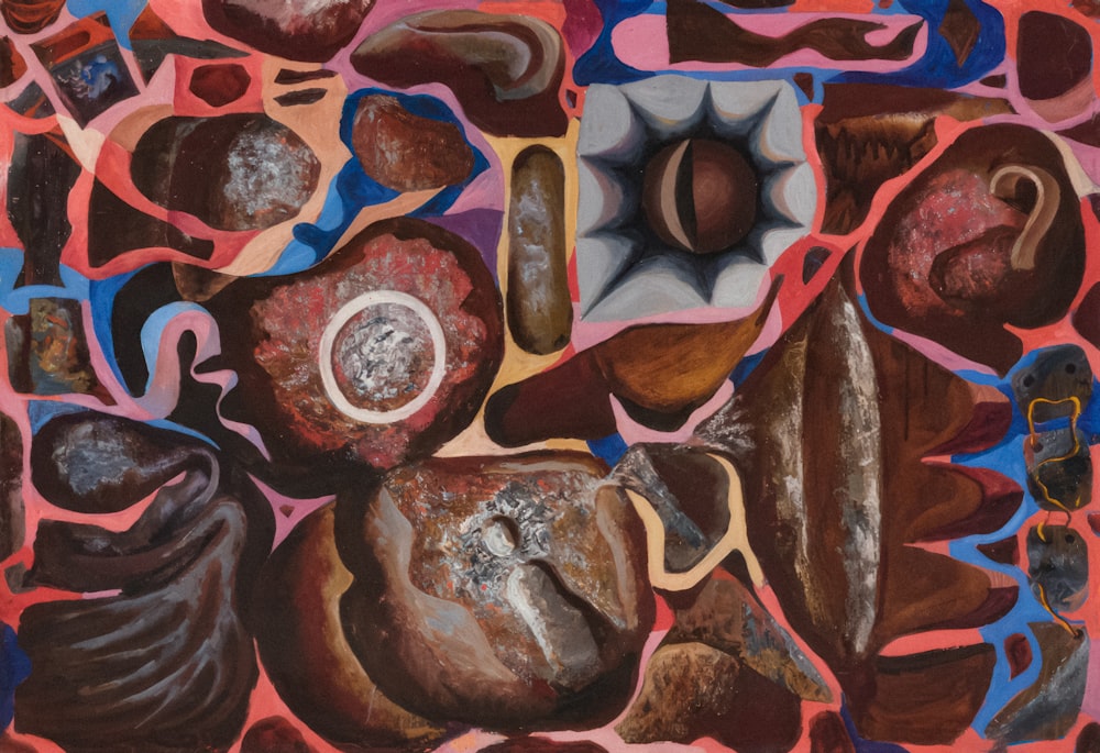 a painting of rocks and other items on a pink background