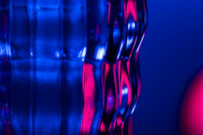 Close-up of a glowing glass panel highlighting its texture and light effects.