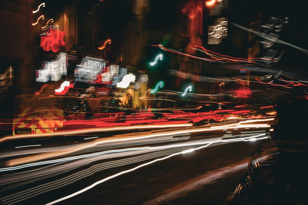 a blurry photo of a city street at night