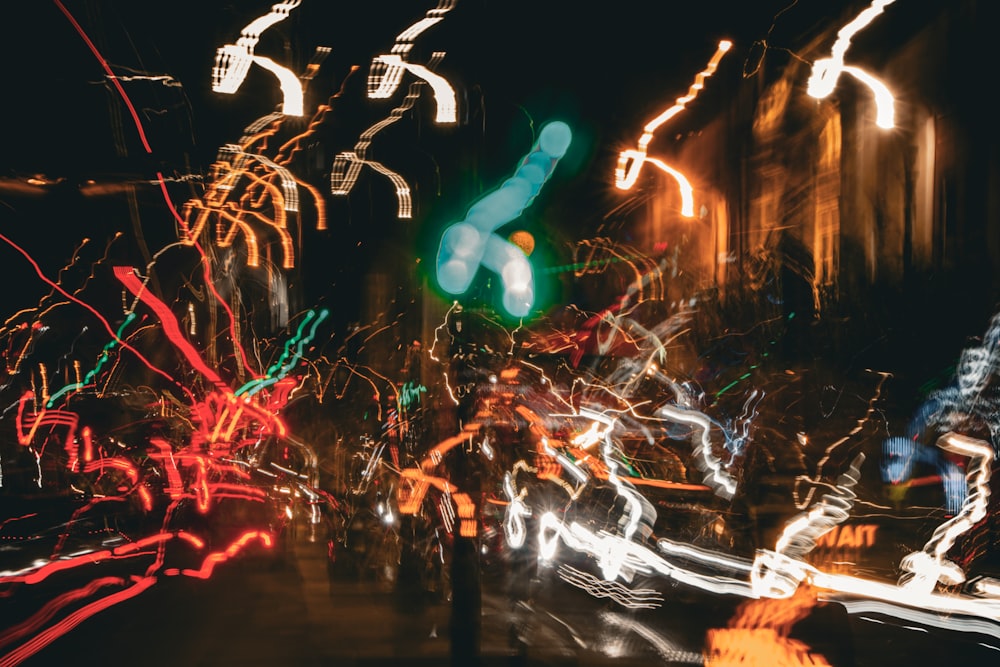 a blurry photo of a city street at night