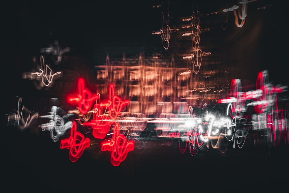 a blurry photo of a city street at night