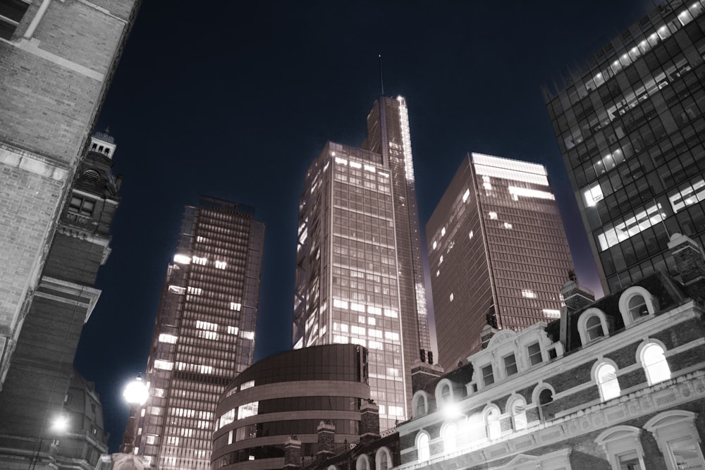 a black and white photo of a city at night