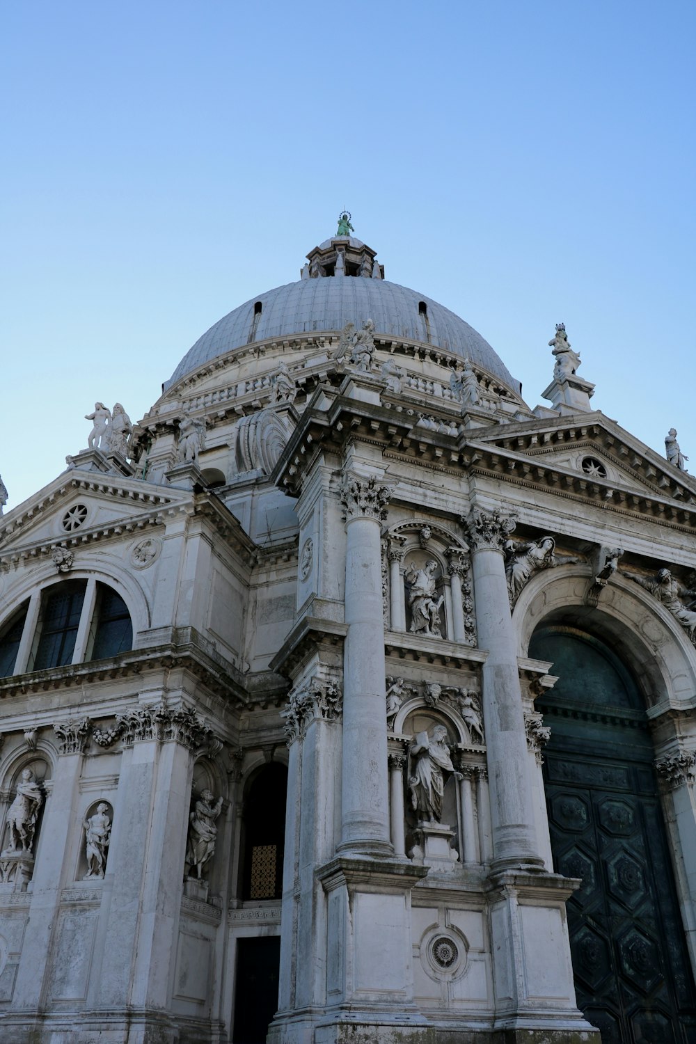 a large white building with a dome on top of it