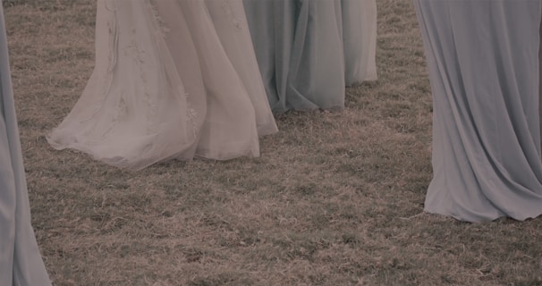 A flowing midi dress in muted tones caught in gentle sunlight, evoking effortless grace and comfort.