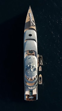 an aerial view of a boat in the water