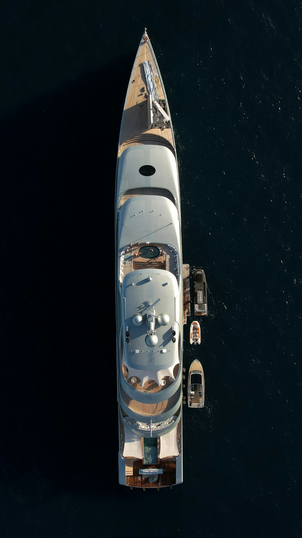 an aerial view of a boat in the water