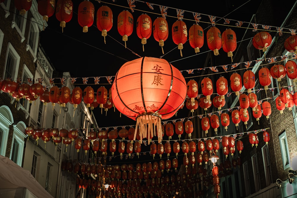a chinese lantern hanging from a string of lights