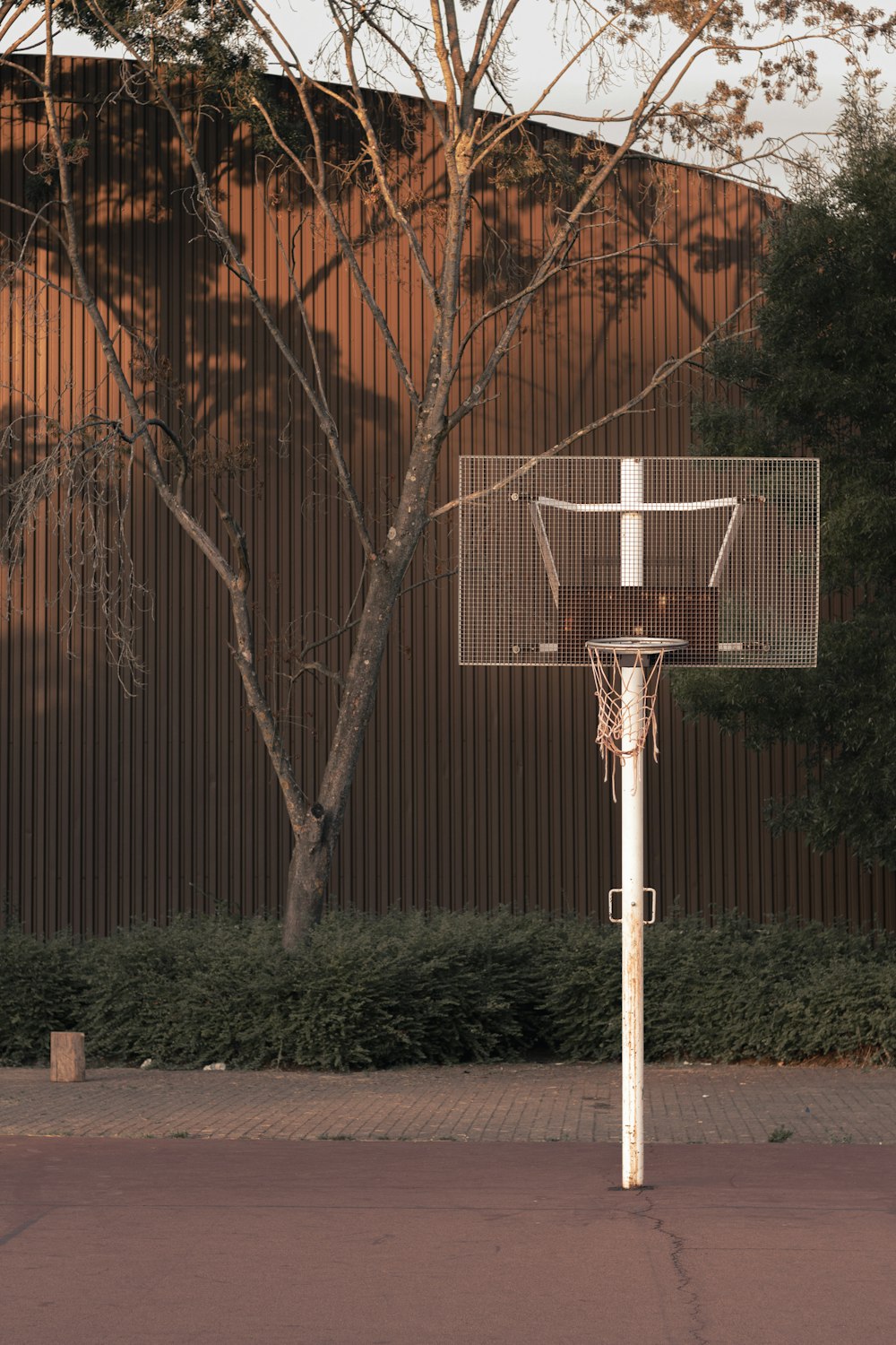 a basketball hoop in front of a building
