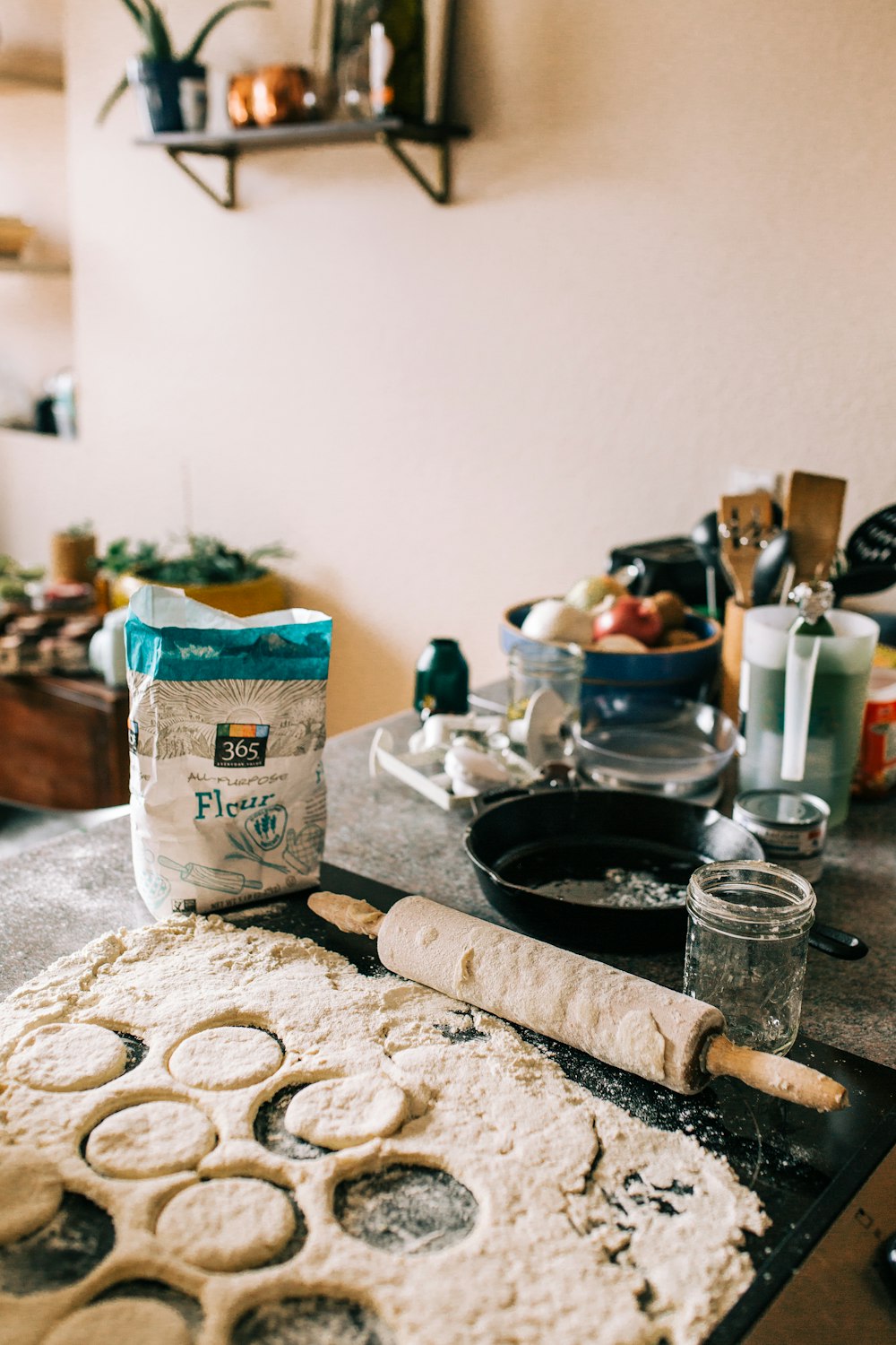 a kitchen counter with a bag of flour on it